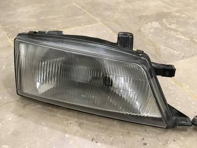 Suzuki Baleno Headlight. Right side only.