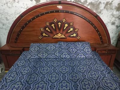 Double wooden bed for sale. Good condition Sohawa