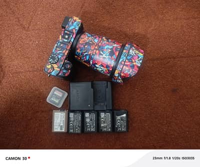 Sony a6400 with 16mm Lense, 5 batteries and 128 GB high speed card