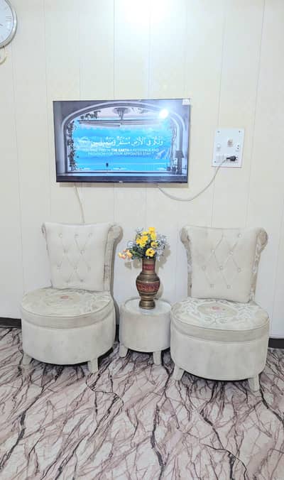 two bedroom chairs and coffee table