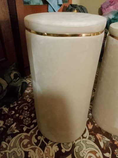 Beige display padestal stand set elegant gold design.