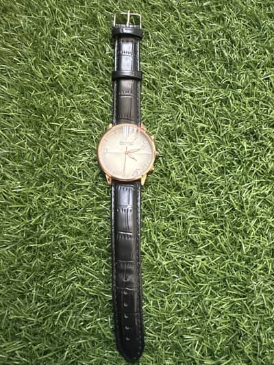 Kebino Rose Gold & Black leather Men,s watch (10/10 condition)