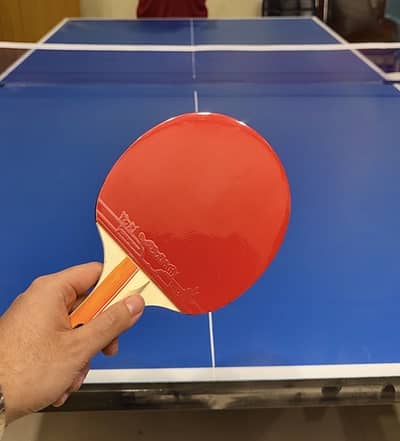 Table tennis with rackets and balls