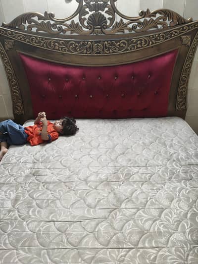 double bed with side table and 15 inch spring mattress