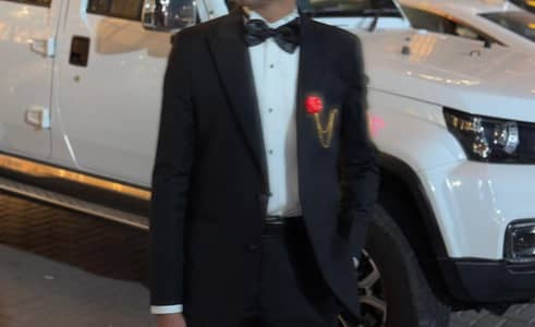 3 piece dark black suit.