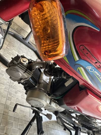 United 70cc bike red colour
