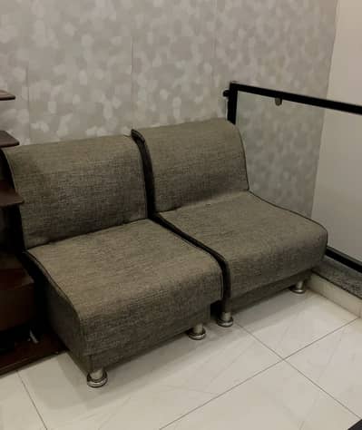 Two single sofa for sale with wooden glass table