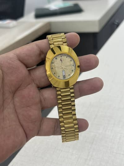 RADO DIASTER GOLDEN DIAL GREEN STONES New Model