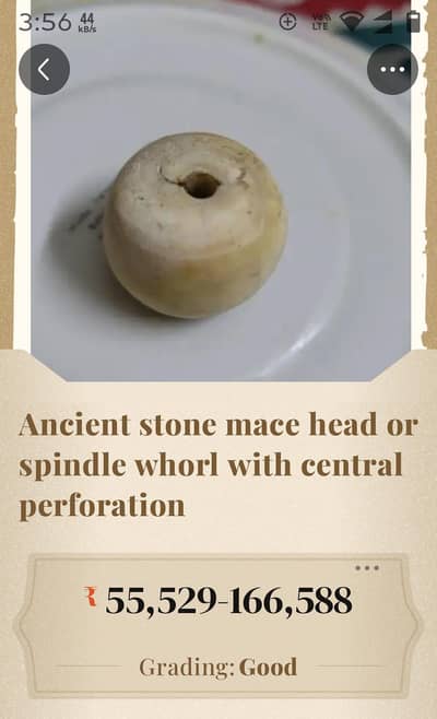 Ancient Stone Mace Head or Spindle whorl with central perforation,