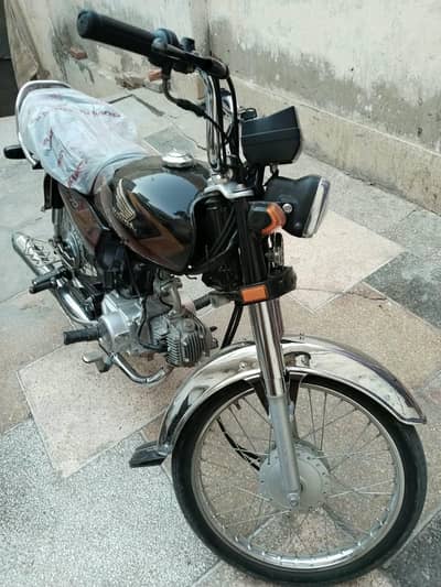 Honda 70cc open letter like new condition