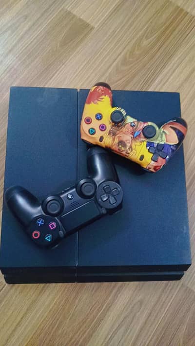 PS4 with 2 controllers Jailbreak with 4 Games used ok condition