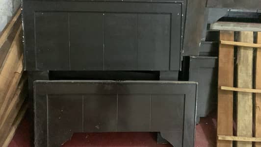 Slightly used single beds are for sale.