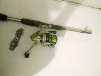 fishing rod and watch