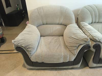Comfortable Single-Seater Beige Armchair with Solid Wood Accent Trim