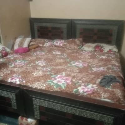 2 single bed  with matterss whatsapp massage kana hai