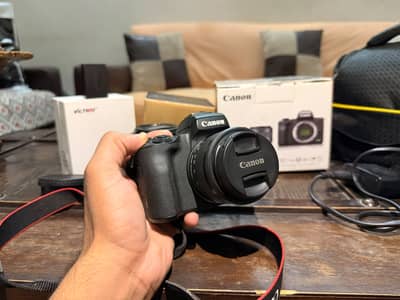 Canon M50 + voltrox EF-EOS M + 15-45mm + 50mm f1.8 Lens.