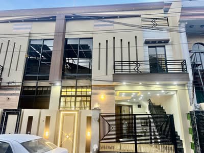 5 Marla Brand New Luxury Modern Style House Super Hot Location All Original Picture attached With Direct Meeting For Sale in Johar Town Phase 2 Near Canal.