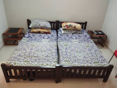 Two single beds for sale
