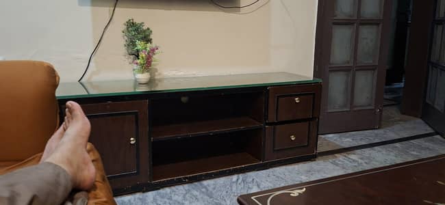 PURE WOOD TV CONSOLE WITH 5 MM GLSS GOING CHEAP IN ERA OF MEHNGAI