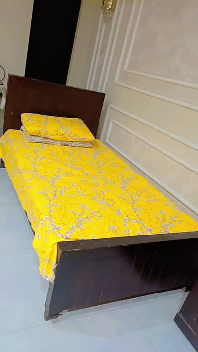 Wooden single bed