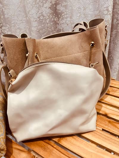 beige velvet bag with