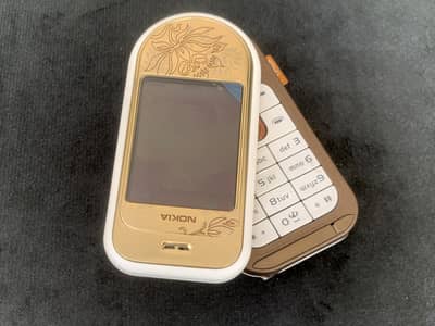 Nokia 7370 Brand New Rare Vintage Swivel Phone with Charger