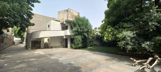 1000 Sq Yards Near RAZI ROAD Ground Plus 1 Constructed With Huge Car Parking Area Main Road Facing