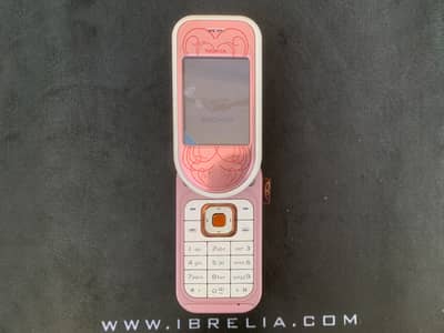Nokia 7370 Brand New Rare Vintage Swivel Phone with Charger