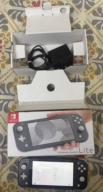 Nintendo Switch Lite (blue and Grey Colour)