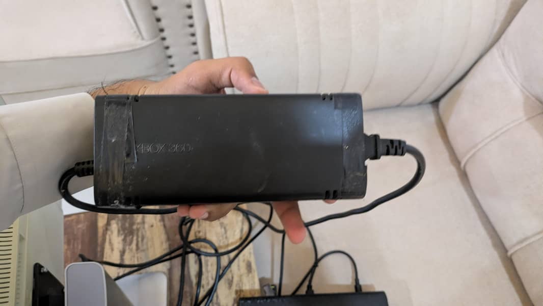 xbox 360 E with wireless controllers 1