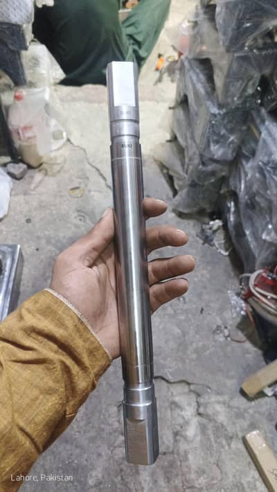 machined steel shaft or pump component