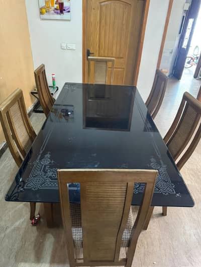 6 seater wooden dinning table with deco paints