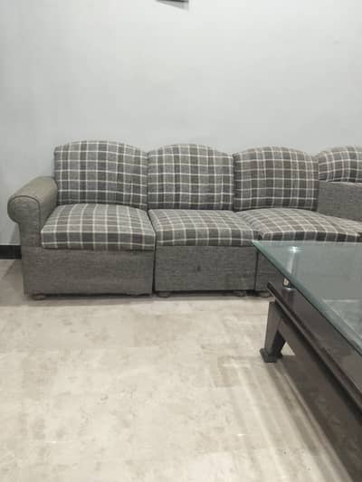 L shape 7 seater Sofa with Center table.