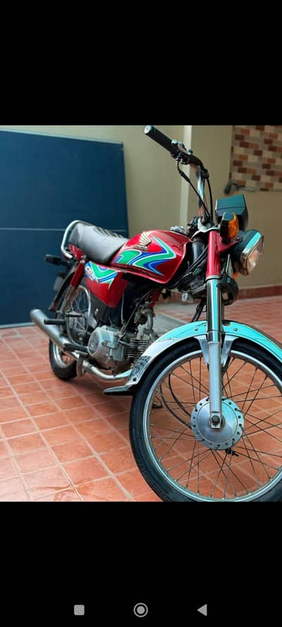 Honda CD 70 papers clear ha one hand