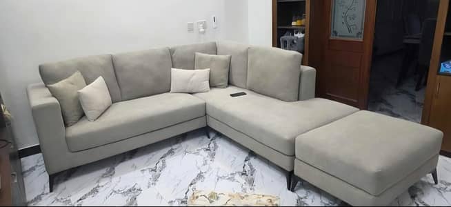 L Shaped sofa and center table