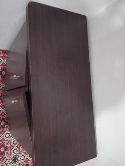 bilkul new jasa ha wooden iron table plus laptop table ma bhi