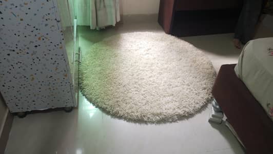 off white shaggy rug