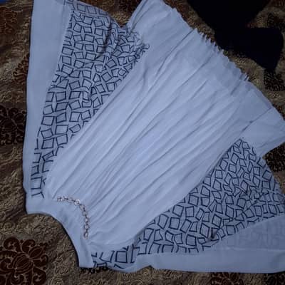 western top with  jeans by Zara