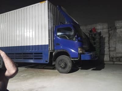 Hino detro truck with 20 feet container