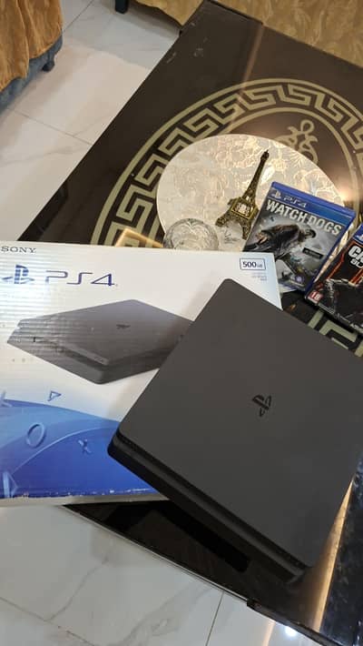 PS4 SLIM 500GB WITH BOX AND 2 CDS