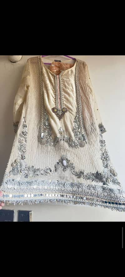 1 Khuda bakhsh white nikkah wear 2 sea green colored sharara dress