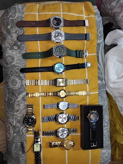 collection of 14 watches  clean condition contact 03195192808 whatsapp