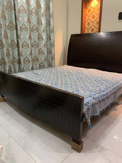 Wooden bed and dressing table