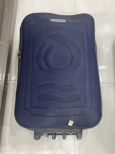 1 large suitcase in blue colour