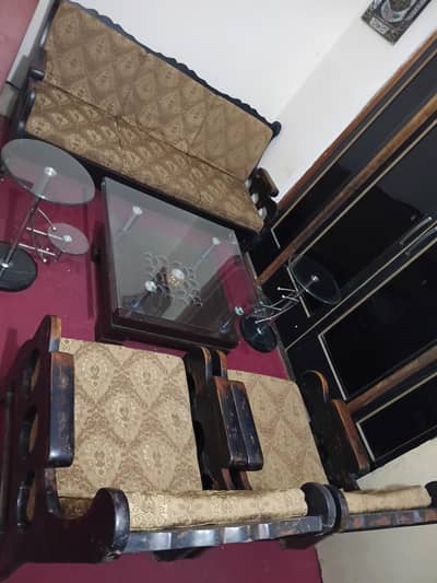 urgent sale pure wooden sofa set table set  sale hai