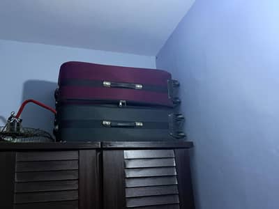 set of 2 large fabric trolley suitcases barely used excellent cond