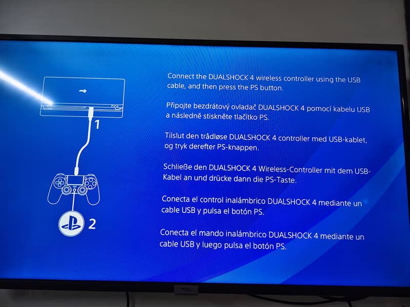 PS4 with two dualshock controllers 3