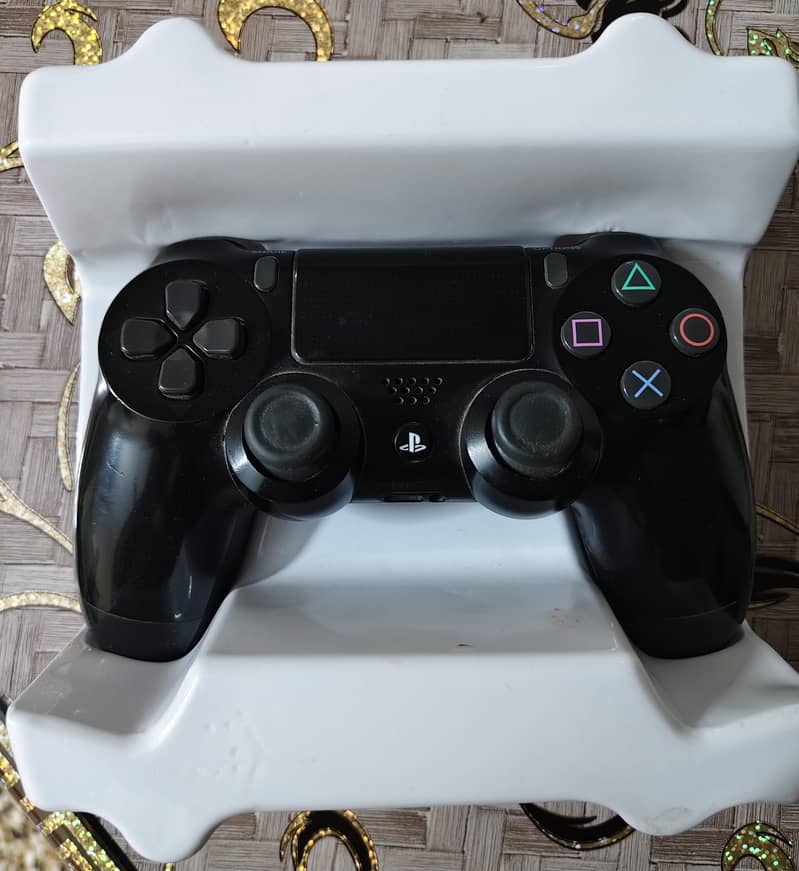PS4 with two dualshock controllers 4