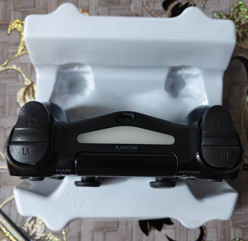 PS4 with two dualshock controllers 5