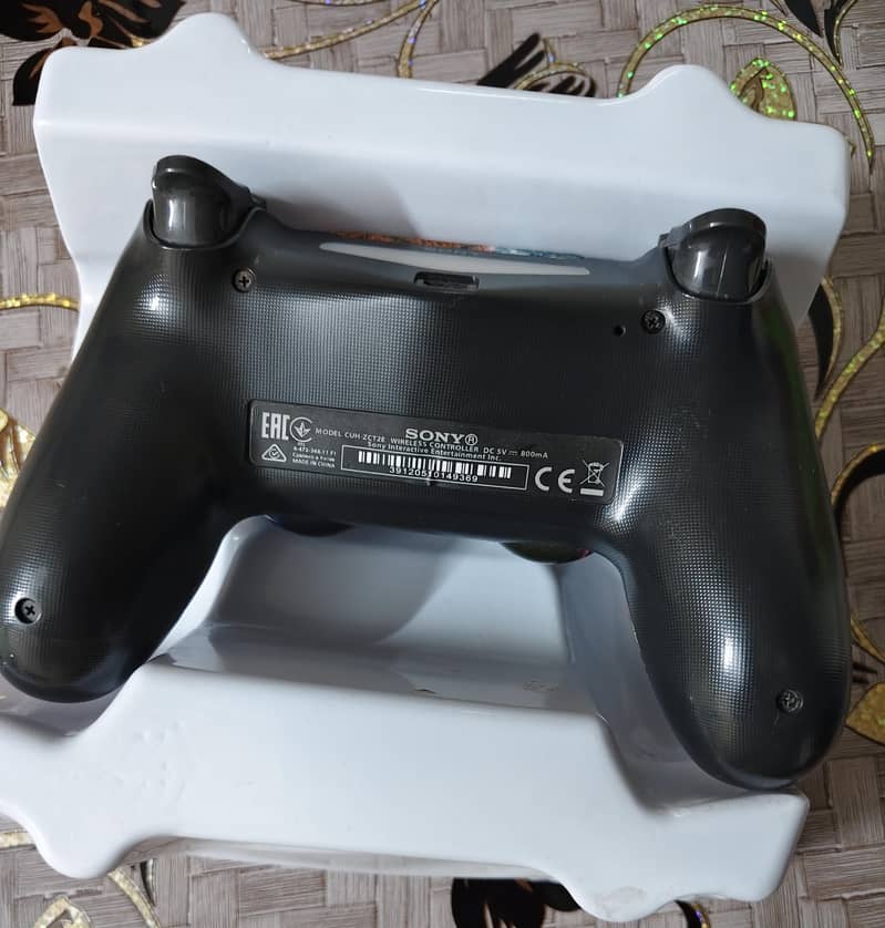 PS4 with two dualshock controllers 7